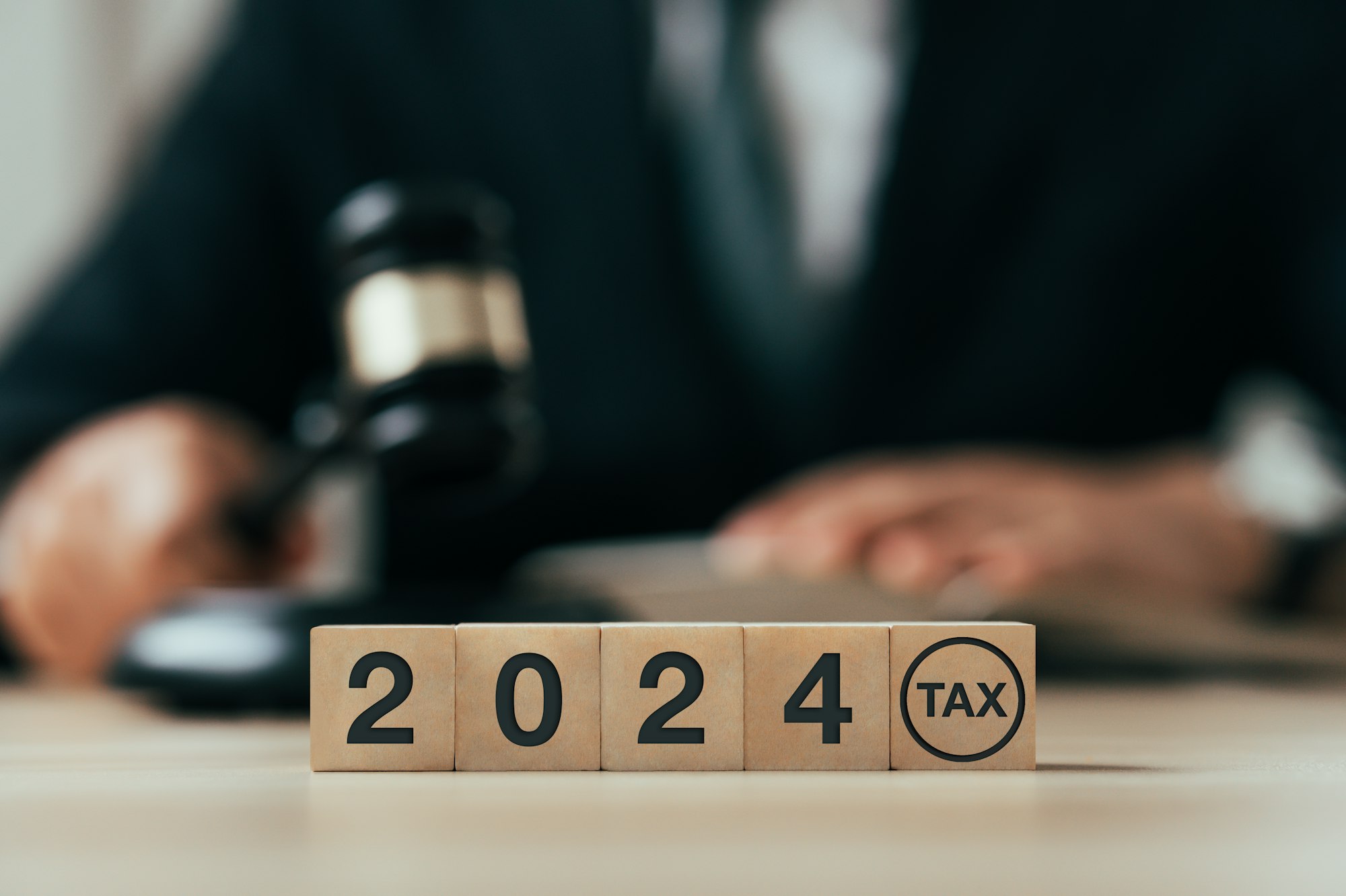 Tax 2024 on wooden blocks. Business and tax concept. Financial calculation, tax, accounting